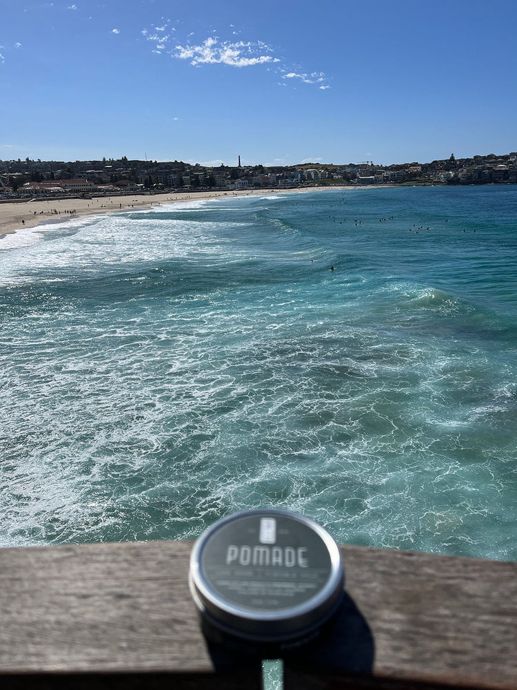 Dr. Watson's pomade overlooking Bondi Beach